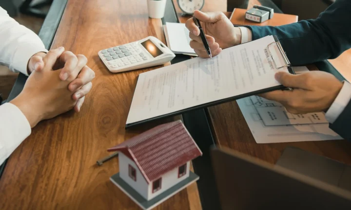 Commercial real estate agent discussing Triple-net lease lease agreement