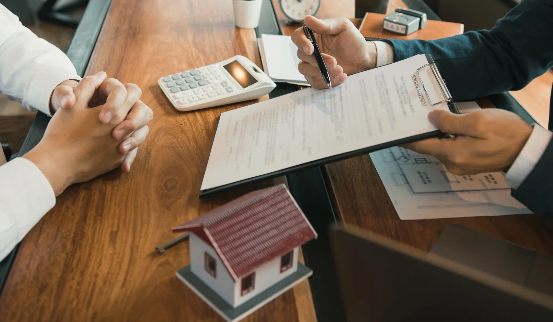 Commercial real estate agent discussing Triple-net lease lease agreement